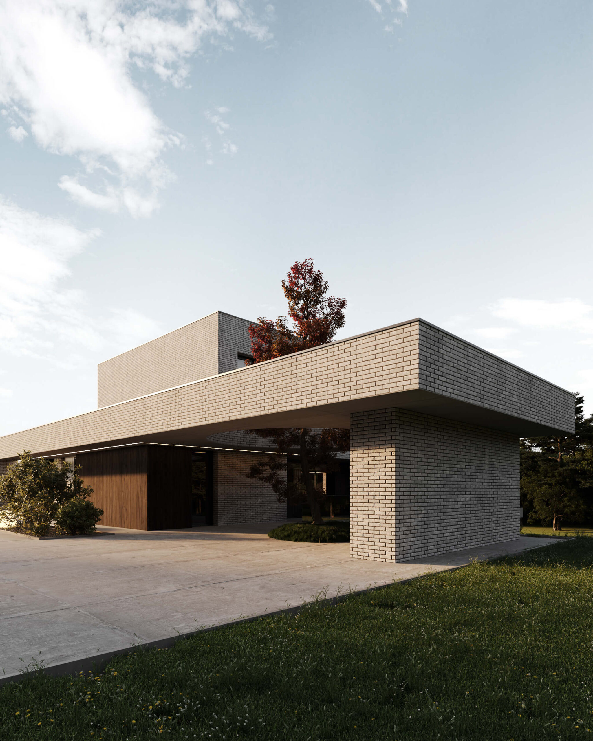 Nowoczesny dom z cegły w Lipsku. Architektura minimalistyczna, zieleń, błękitne niebo.