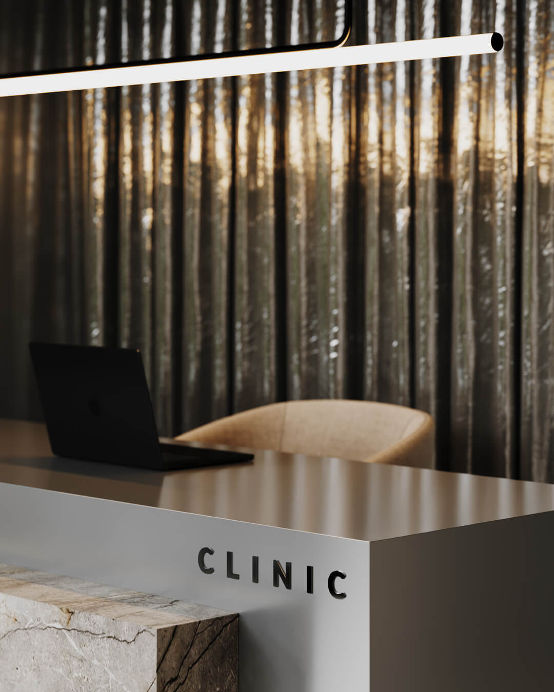 Recepcja przychodni lekarskiej z laptopem i napisem 