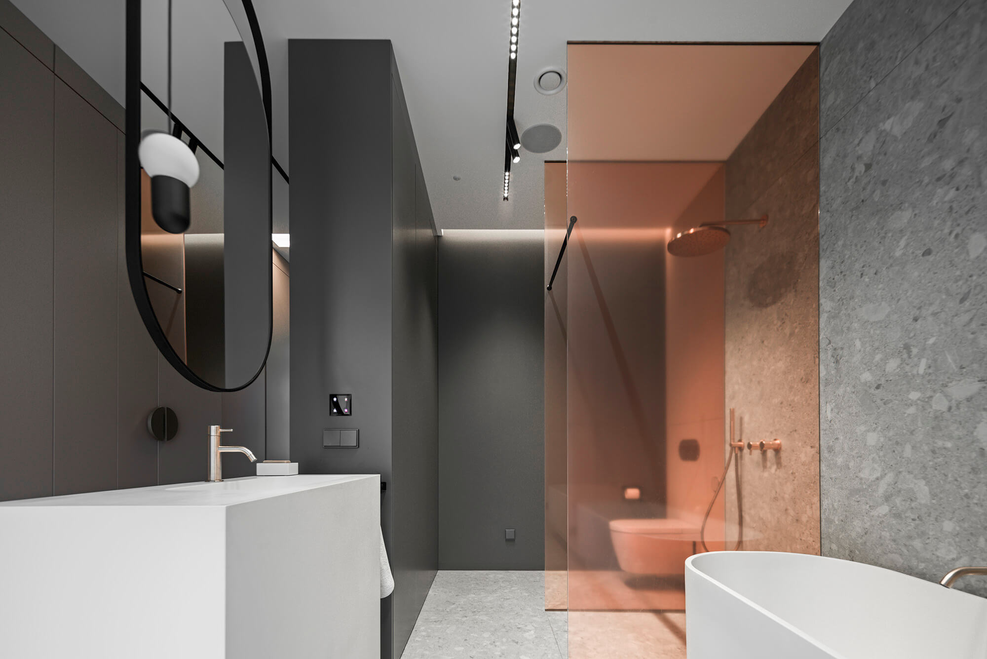 Nowoczesna łazienka z umywalką, lustrem i kabiną prysznicową z pomarańczowego szkła.