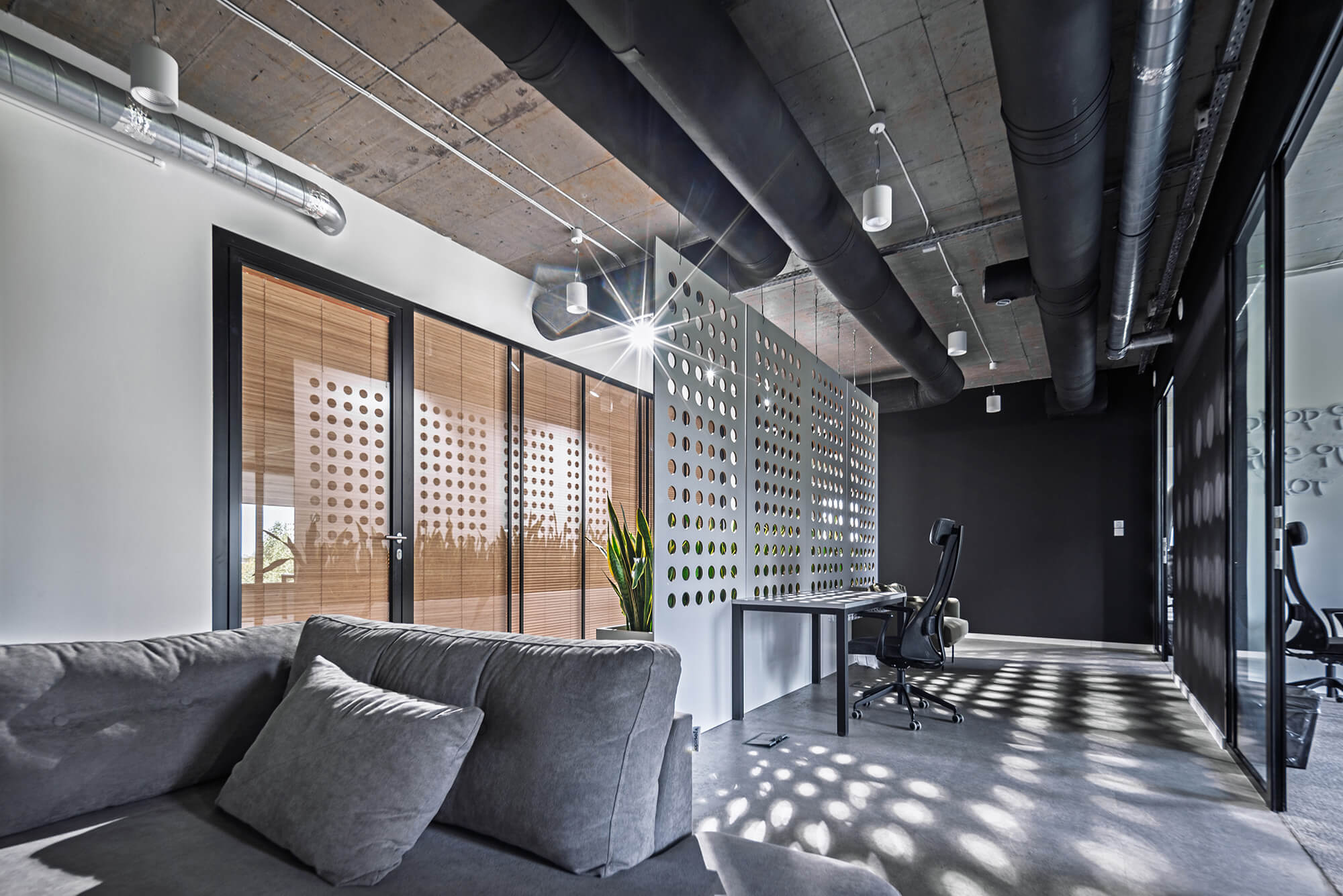 Minimalist kitchen with modern design elements and sleek countertops.